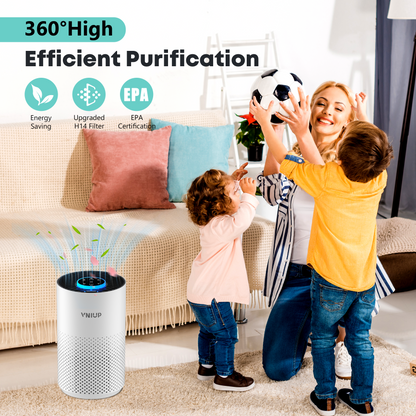 Woman playing with two children in a living room with an air purifier in the foreground.