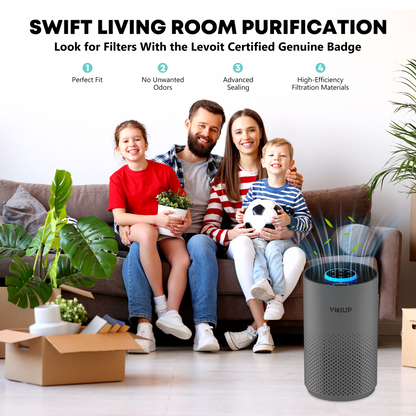 Family sitting on a couch with an air purifier in the foreground, emphasizing living room purification.