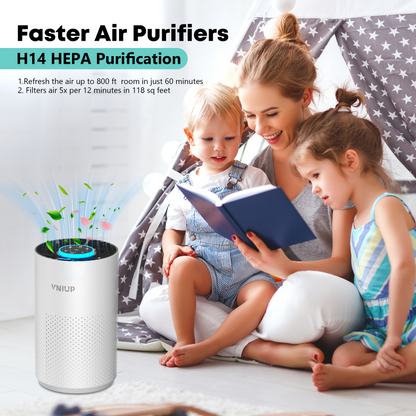 Woman reading a book to two children with an air purifier in the foreground
